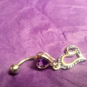 Belly button jewelry.